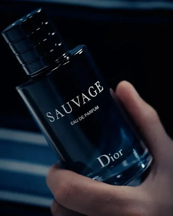 Dior x Esquire Japan campaign - Sauvage fragrance bottle held in hand